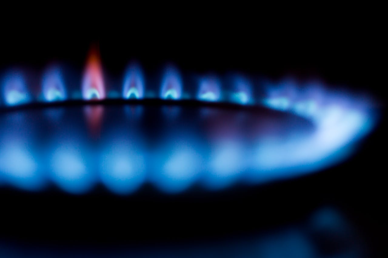 Close-up of a gas flame, representing the fire risk hidden inside RV absorption refrigerators